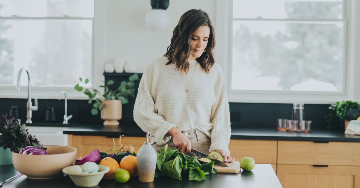 A woman cutting vegetables